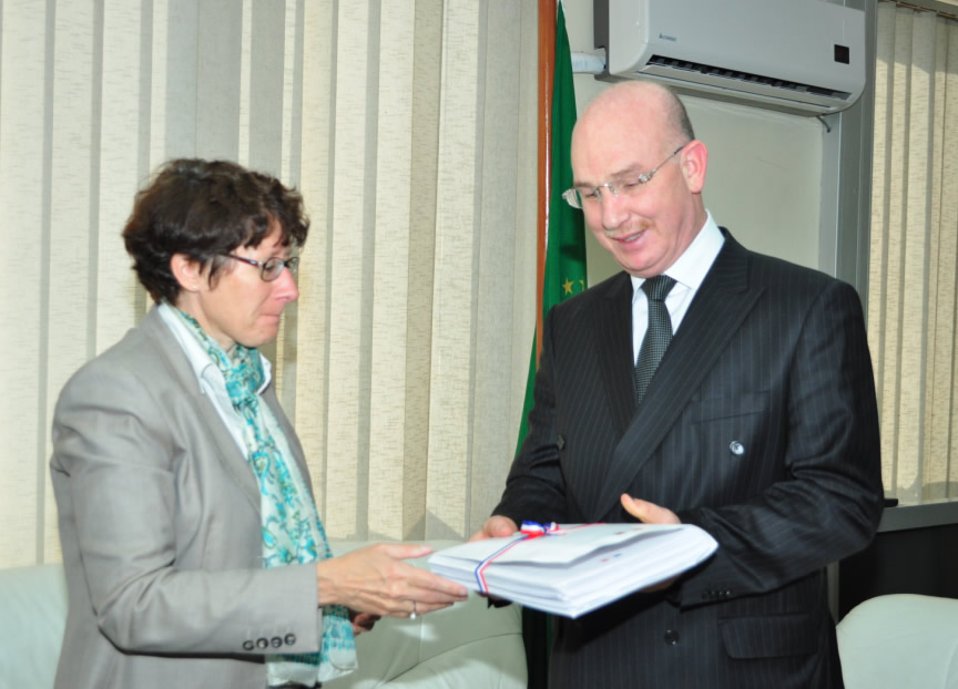 Ambassador of France to Ethiopia and to the AU, Brigitte Collet , handing over copies of 45 Agreements relating to African borders, to AU Commissioner for Peace and Security, Ambassador Smail Chergui